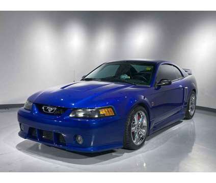2004 Ford Mustang GT is a Blue 2004 Ford Mustang GT Coupe in Depew NY