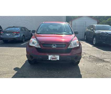 2009 Honda CR-V LX is a Red 2009 Honda CR-V LX SUV in Akron OH