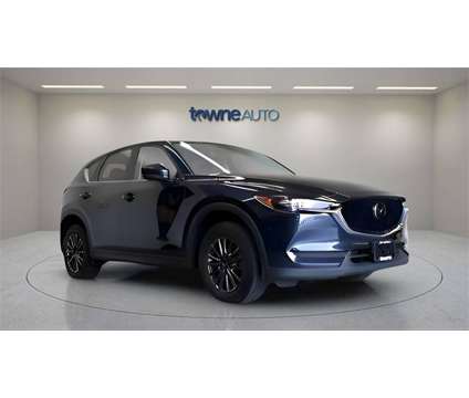 2021 Mazda CX-5 Touring is a Blue 2021 Mazda CX-5 Touring SUV in Orchard Park NY