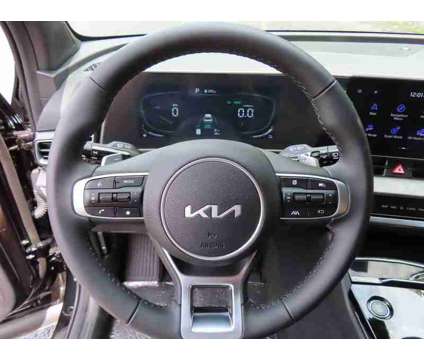 2024 Kia Sportage Plug-In Hybrid X-Line is a Black 2024 Kia Sportage 4dr Hybrid in Oconomowoc WI