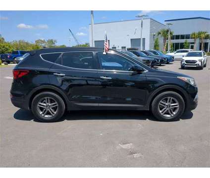 2017 Hyundai Santa Fe Sport 2.4 Base is a Black 2017 Hyundai Santa Fe Sport SUV in Vero Beach FL