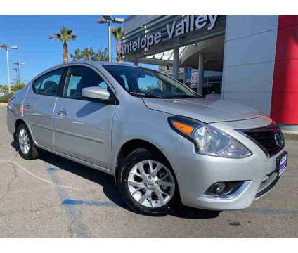 2018 Nissan Versa 1.6 SV is a Silver 2018 Nissan Versa 1.6 SV Sedan in Palmdale CA