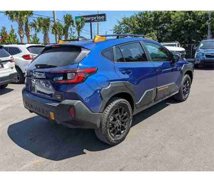 2024 Subaru Crosstrek Wilderness is a Blue 2024 Subaru Crosstrek 2.0i SUV in Vero Beach FL