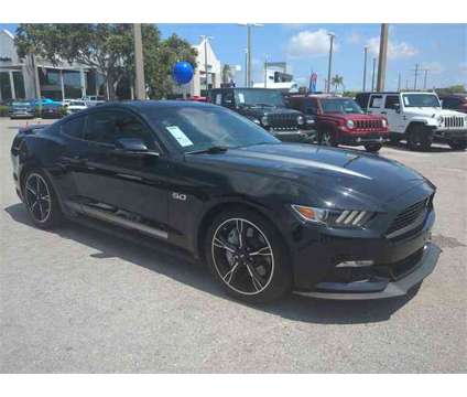 2016 Ford Mustang GT is a Black 2016 Ford Mustang GT Coupe in Naples FL