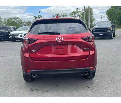 2021 Mazda CX-5 Touring is a Red 2021 Mazda CX-5 Touring SUV in Utica NY