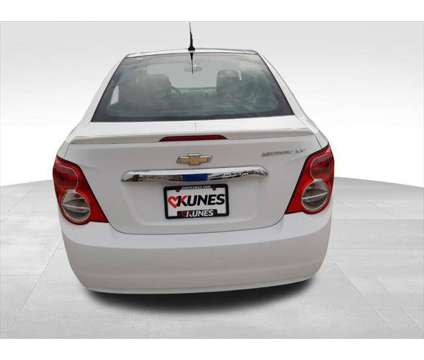 2013 Chevrolet Sonic LT Auto is a White 2013 Chevrolet Sonic LT Sedan in Quincy IL