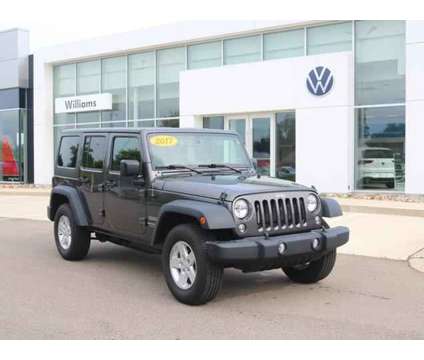 2017 Jeep Wrangler Unlimited Sport 4x4 is a Grey 2017 Jeep Wrangler Unlimited Sport SUV in Lansing MI