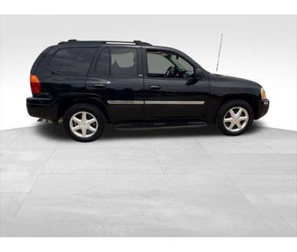 2007 GMC Envoy SLT is a Black 2007 GMC Envoy SLT SUV in Quincy IL