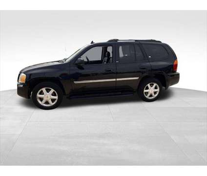 2007 GMC Envoy SLT is a Black 2007 GMC Envoy SLT SUV in Quincy IL