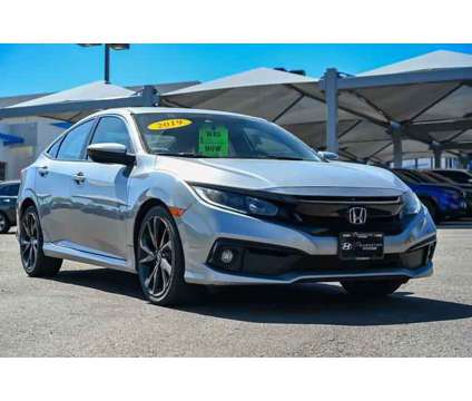 2019 Honda Civic Sport is a 2019 Honda Civic Sport Sedan in Denver CO