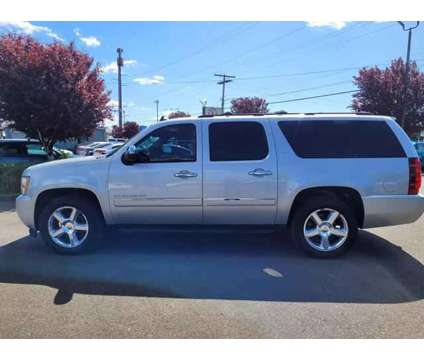 2013 Chevrolet Suburban 1500 for sale is a Silver 2013 Chevrolet Suburban 1500 Trim Car for Sale in Auburn WA