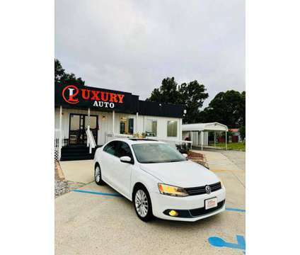 2013 Volkswagen Jetta for sale is a White 2013 Volkswagen Jetta 2.5 Trim Car for Sale in Baton Rouge LA