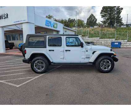 2020 Jeep Wrangler Unlimited Sahara is a White 2020 Jeep Wrangler Unlimited Sahara Car for Sale in Colorado Springs CO