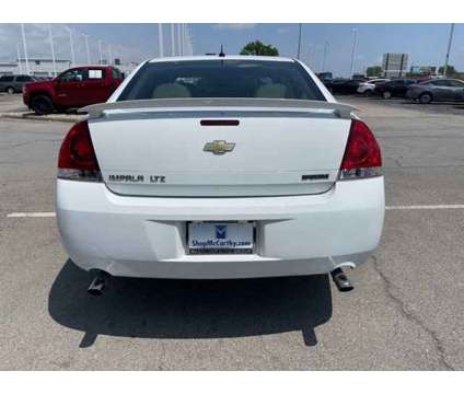 2013 Chevrolet Impala LTZ is a White 2013 Chevrolet Impala LTZ Car for Sale in Olathe KS