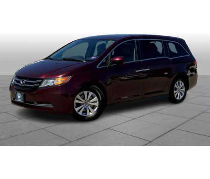 2015UsedHondaUsedOdysseyUsed5dr is a Red 2015 Honda Odyssey Car for Sale in Saco ME