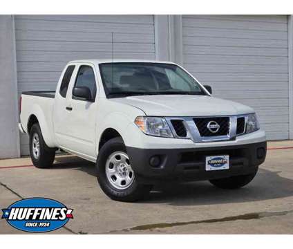 2021UsedNissanUsedFrontierUsedKing Cab 4x2 Auto is a White 2021 Nissan frontier Car for Sale in Lewisville TX