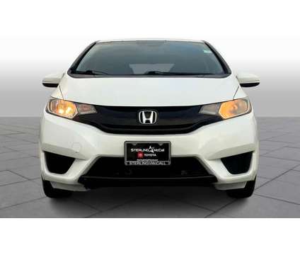 2015UsedHondaUsedFitUsed5dr HB CVT is a White 2015 Honda Fit Car for Sale in Houston TX