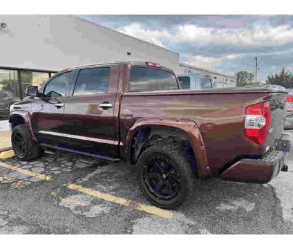 2014UsedToyotaUsedTundraUsedCrewMax 5.7L V8 6-Spd AT is a Tan 2014 Toyota Tundra Car for Sale in Miami OK