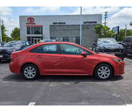 2021 Toyota Corolla LE is a Red 2021 Toyota Corolla LE Car for Sale in Clarksville MD