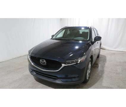 2021UsedMazdaUsedCX-5UsedAWD is a Blue 2021 Mazda CX-5 Car for Sale in Brunswick OH