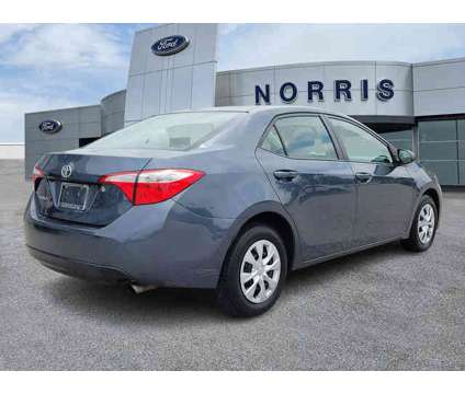 2016 Toyota Corolla L is a Grey 2016 Toyota Corolla L Car for Sale in Dundalk MD