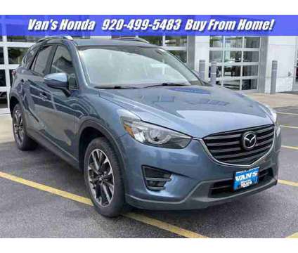 2016 Mazda CX-5 Grand Touring is a Blue 2016 Mazda CX-5 Grand Touring Car for Sale in Green Bay WI