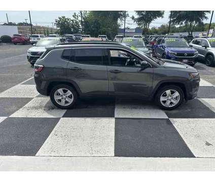 2022 Jeep Compass Latitude is a Grey 2022 Jeep Compass Latitude Car for Sale in Wilmington NC