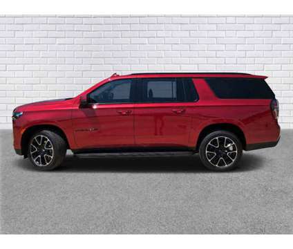 2024 Chevrolet Suburban RST is a Red 2024 Chevrolet Suburban 1500 Trim Car for Sale in Collins MS