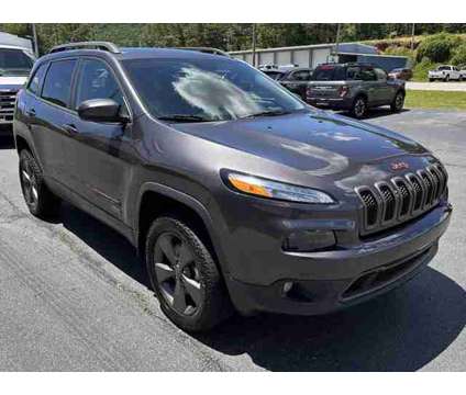 2016 Jeep Cherokee 75th Anniversary is a Grey 2016 Jeep Cherokee Car for Sale in Hayesville NC