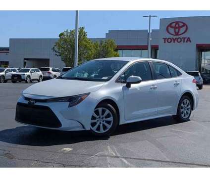 2024 Toyota Corolla LE is a White 2024 Toyota Corolla LE Sedan in Naperville IL