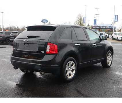 2011 Ford Edge SEL is a Black 2011 Ford Edge SEL Car for Sale in Traverse City MI