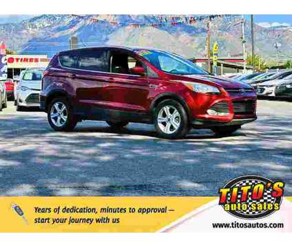 2015 Ford Escape for sale is a Orange 2015 Ford Escape Car for Sale in Murray UT