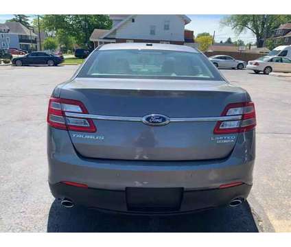 2013 Ford Taurus for sale is a Grey 2013 Ford Taurus Car for Sale in Toledo OH