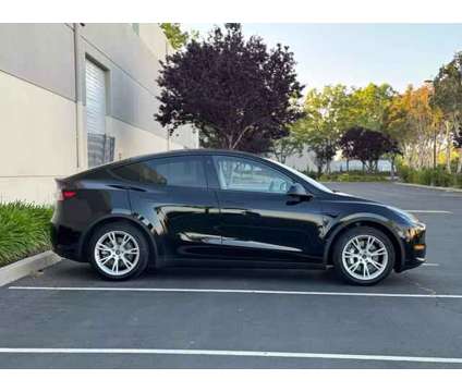2021 Tesla Model Y for sale is a Black 2021 Car for Sale in Newark CA