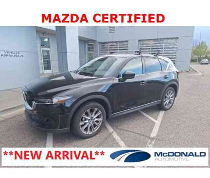2021 Mazda CX-5 Grand Touring is a Black 2021 Mazda CX-5 Grand Touring SUV in Littleton CO