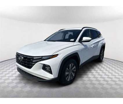 2022 Hyundai Tucson Hybrid Blue is a White 2022 Hyundai Tucson Hybrid in Newnan GA