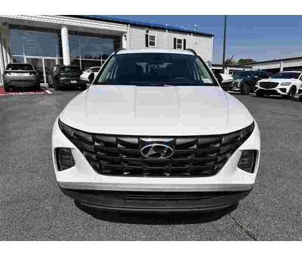 2022 Hyundai Tucson Hybrid Blue is a White 2022 Hyundai Tucson Hybrid in Newnan GA