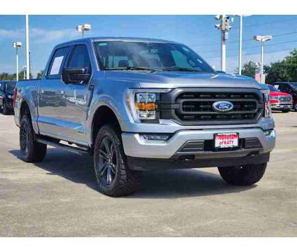 2023 Ford F-150 XLT is a Silver 2023 Ford F-150 XLT Truck in Katy TX