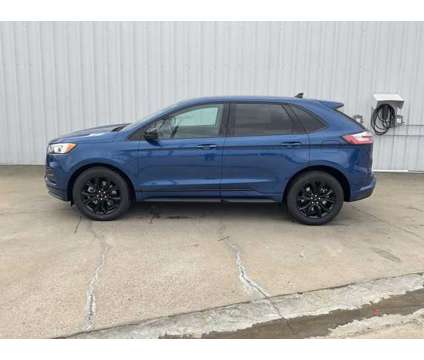 2024 Ford Edge SE is a Blue 2024 Ford Edge SE SUV in Corsicana TX