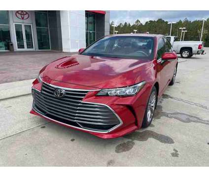 2021 Toyota Avalon XLE is a Red 2021 Toyota Avalon XLE Sedan in Moss Point MS