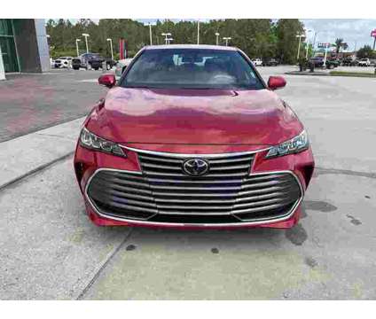2021 Toyota Avalon XLE is a Red 2021 Toyota Avalon XLE Sedan in Moss Point MS