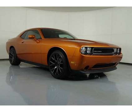 2011 Dodge Challenger Base is a Orange 2011 Dodge Challenger Base Coupe in Sandusky MI