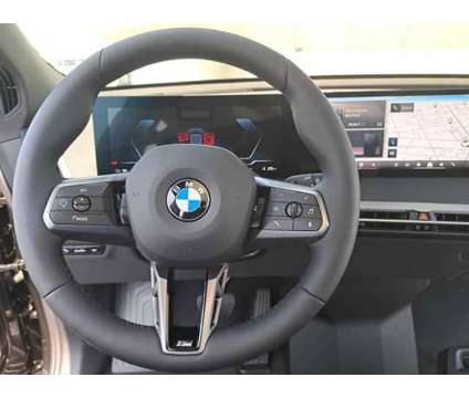 2025 BMW iX xDrive50 is a Grey 2025 BMW 325 Model iX SUV in Alhambra CA