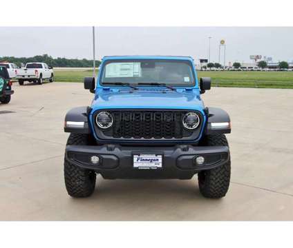 2024 Jeep Wrangler Willys Wheeler is a Blue 2024 Jeep Wrangler SUV in Rosenberg TX