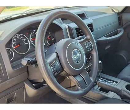 2012 Jeep Liberty Sport is a Silver 2012 Jeep Liberty Sport SUV in Loveland CO