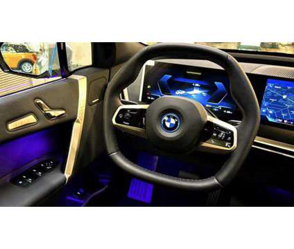 2025 BMW iX xDrive50 is a White 2025 BMW 325 Model iX SUV in Huntington Station NY