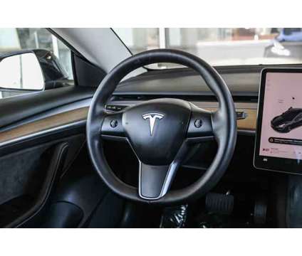 2023 Tesla Model 3 Base is a Black 2023 Tesla Model 3 Sedan in Ontario CA