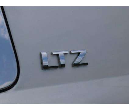 2015 Chevrolet Suburban LTZ is a White 2015 Chevrolet Suburban LTZ SUV in Friendswood TX