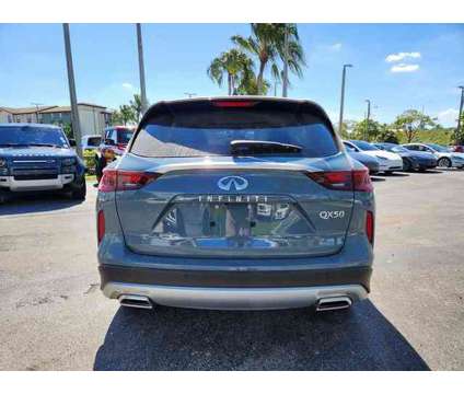 2024 Infiniti Qx50 Luxe is a Grey 2024 Infiniti QX50 Luxe SUV in Fort Lauderdale FL