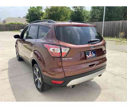 2018 Ford Escape SEL is a Brown 2018 Ford Escape SEL SUV in Dallas TX